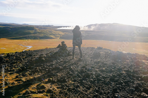 Woman Overlooking Icelandic Landscape