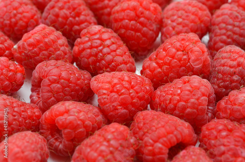 large garden raspberry berries close-up