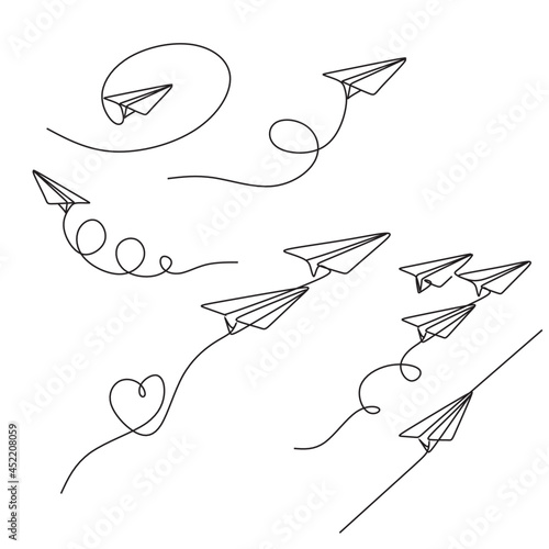 One line drawing of paper airplane. Concept of plane flying symbol of creativity and freedom.
