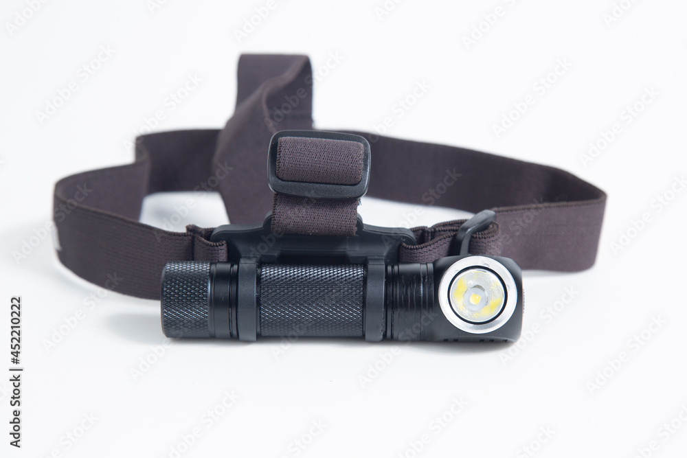 A headlamp. Autonomous lighting device for mounting on the head . A headlamp. Autonomous lighting device for mounting on the head .
