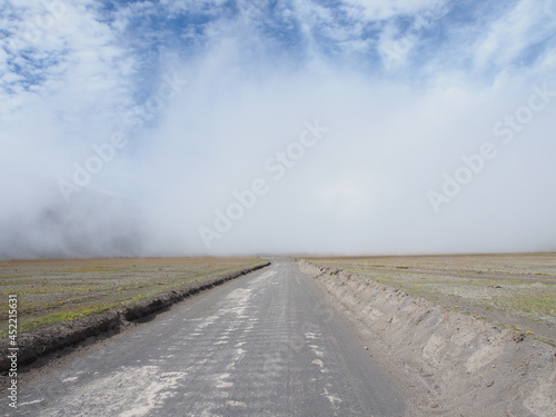 Misty road next to Cotopaxi volcano in Ecuador