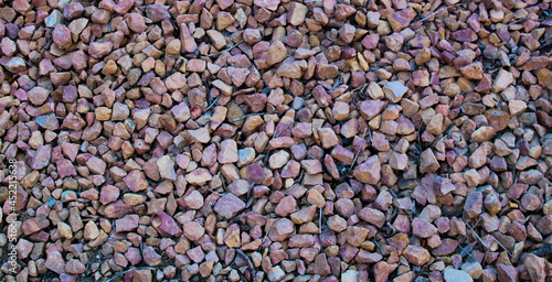 Pinkish-Brown Rocks On Ground