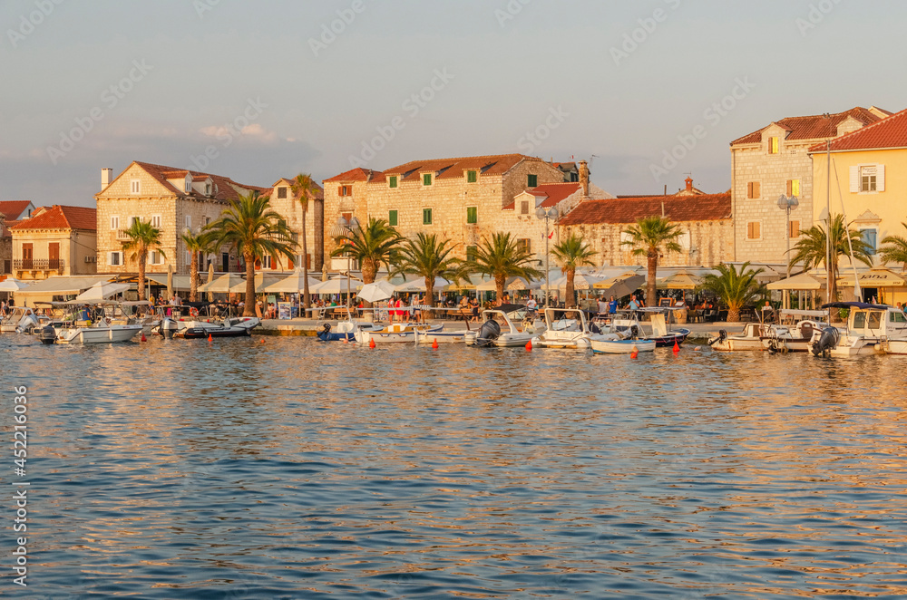 Picturesque old town of Supetar in sunset light. Supetar is the biggest town of Brac island in Croatia.
