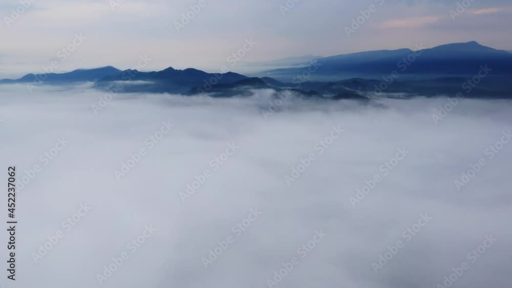 Hyper lapse by Drone, Beautiful Landscape in the morning time
during sunrise with fog above the mountain, White fluffy clouds moving softly on cloudy, Pang puai Mae moh Lampang, Thailand. Hyper lapse by Drone, Beautiful Landscape in the morning time
during sunrise with fog above the mountain, White fluffy clouds moving softly on cloudy, Pang puai Mae moh Lampang, Thailand.