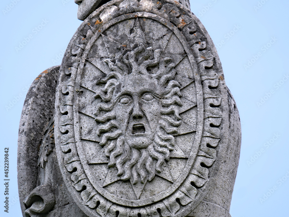 Medusa face on shield, old stone monument to War of 1812, Queenston Heights, Canada