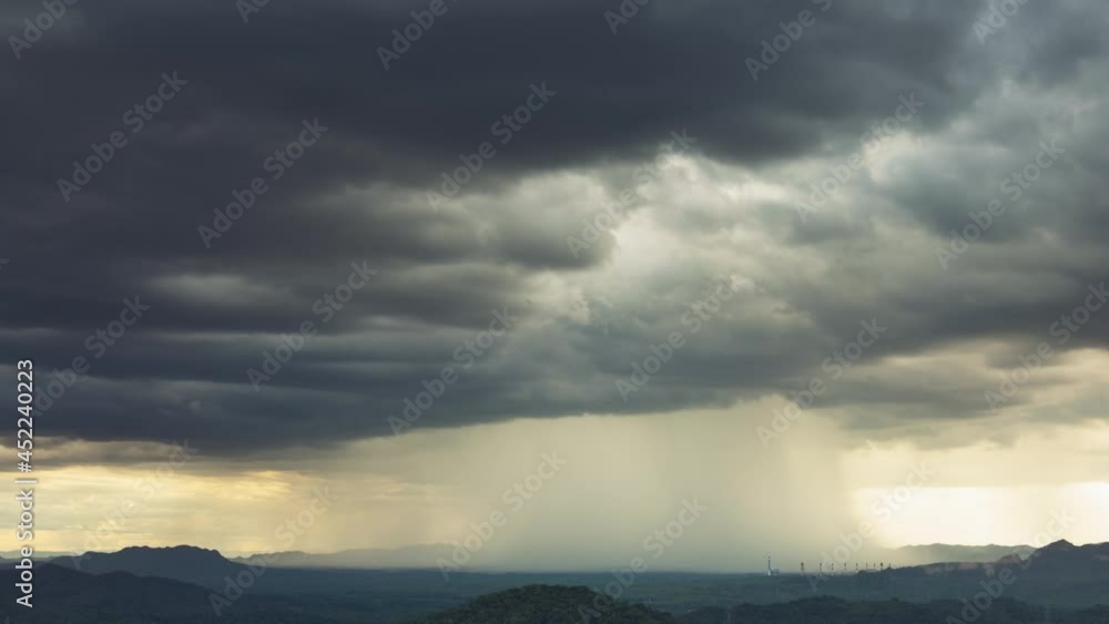 Aerial view Nature environment Dark sky Big clouds Black moving storm clouds Thunderstorms on the horizon Time lapse Giant storms Fast moving Movie time Mea Mo, Lam pang Thailand. Aerial view Nature environment Dark sky Big clouds Black moving storm clouds Thunderstorms on the horizon Time lapse Giant storms Fast moving Movie time Mea Mo, Lam pang Thailand.