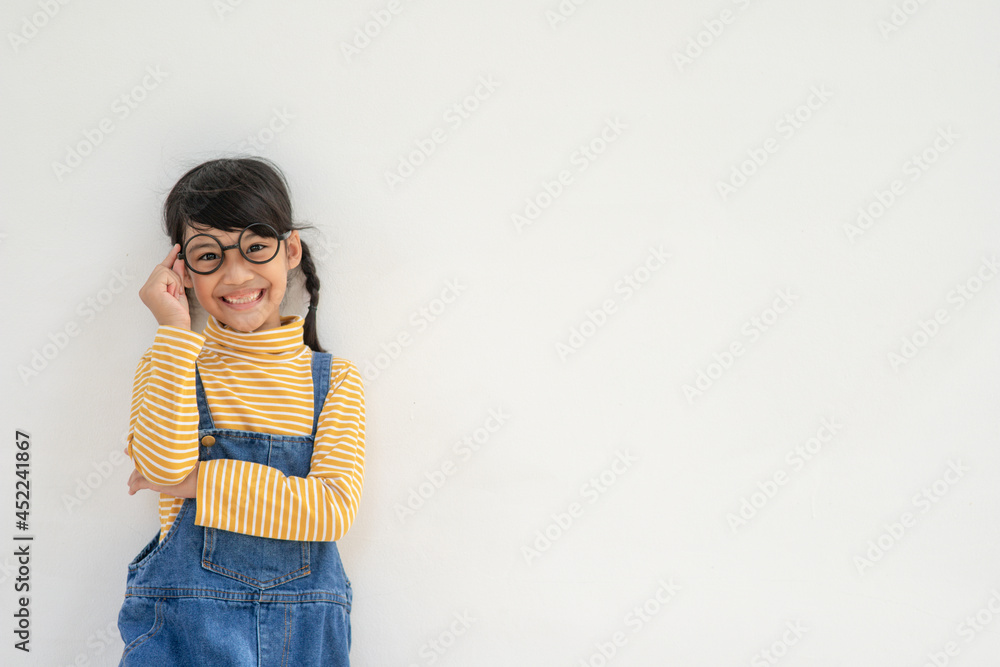 Portrait of funny smiling little girl child wearing glasses Portrait of funny smiling little girl child wearing glasses