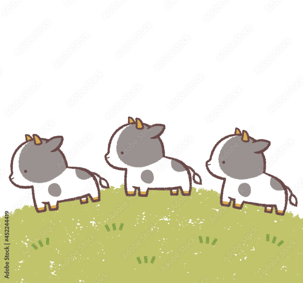 Obraz premium 複数のウシと芝生のフレーム