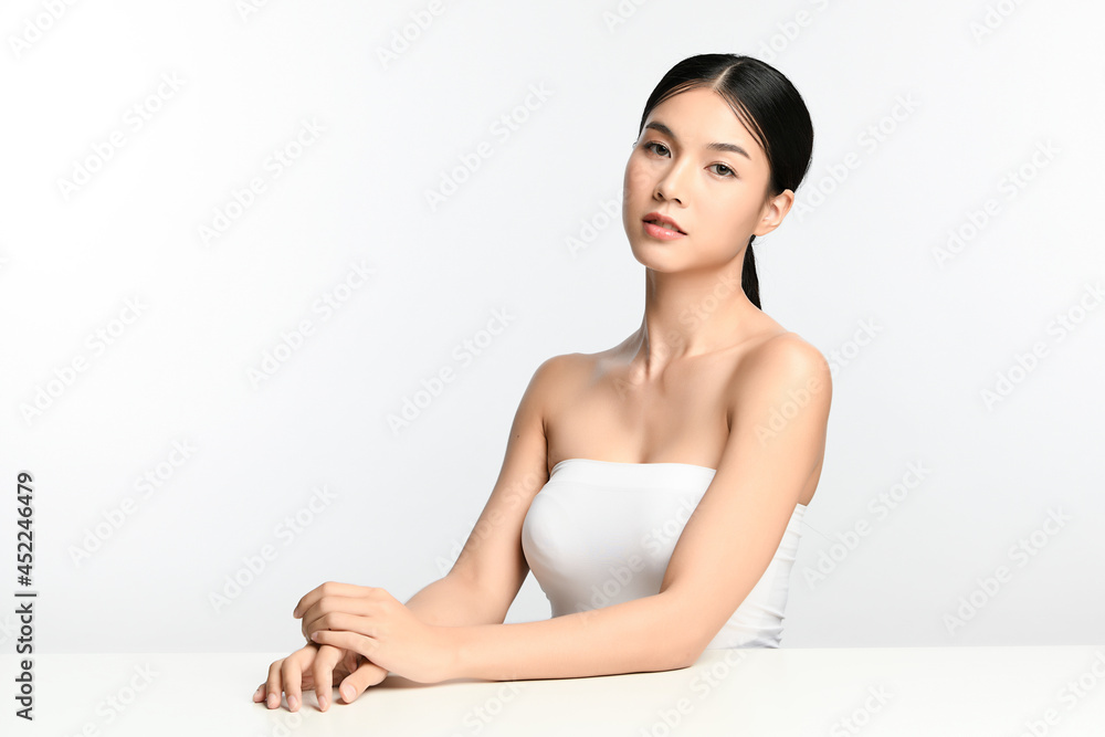 Beautiful young asian woman with clean fresh skin on white background, Face care, Facial treatment, Cosmetology, beauty and spa, Asian women portrait. Beautiful young asian woman with clean fresh skin on white background, Face care, Facial treatment, Cosmetology, beauty and spa, Asian women portrait.