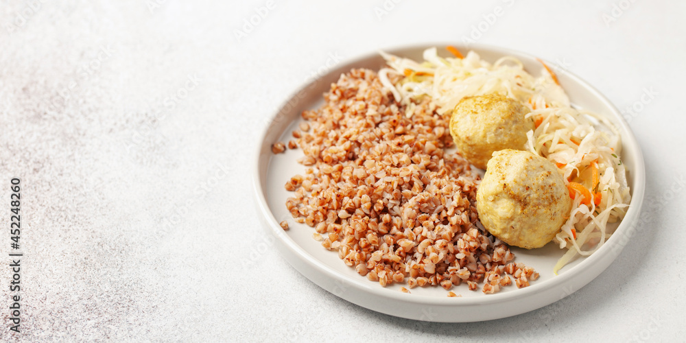 Meatballs with buckwheat porridge and cabbage salad. Baby or diet nutrition Meatballs with buckwheat porridge and cabbage salad. Baby or diet nutrition