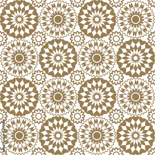 Seamless abstract floral pattern. Geometric ornament of leaves. Graphic modern pattern in golden beige tones on a white background.
