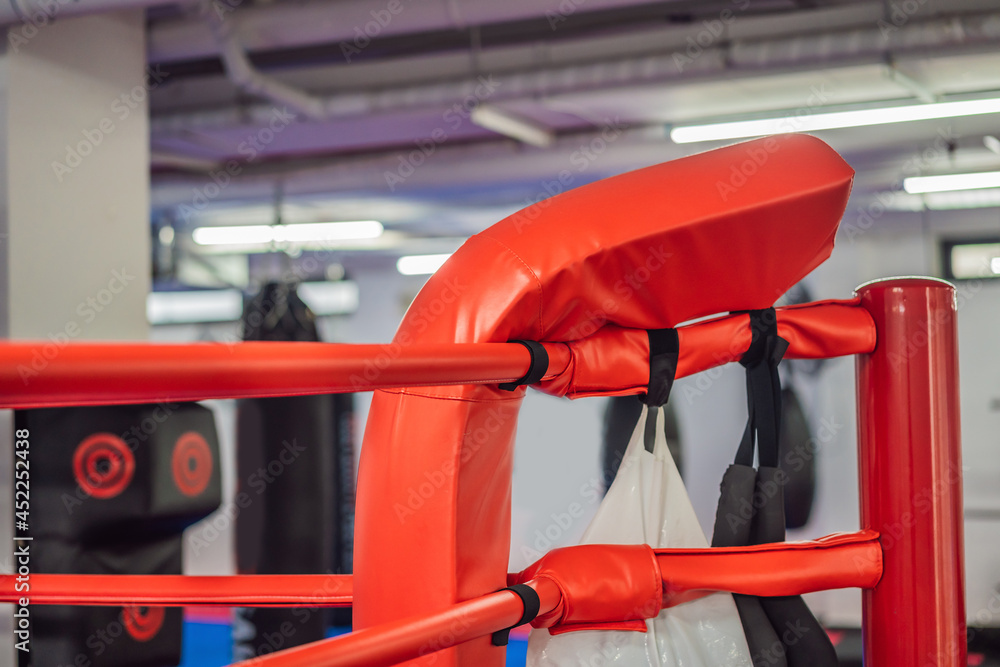 boxing equipment on the ropes of a boxing ring