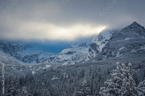 Dark blue sky over High Tatra peaks, Tatry National Park, Poland. The view from Hala Gąsienicowa Valley. Selective focus on the ridge, blurred background.