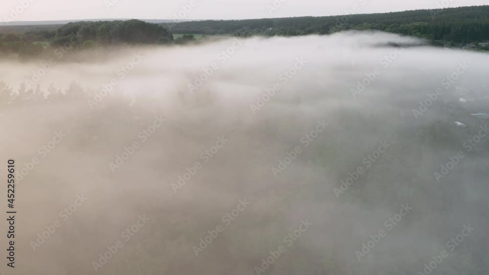 Smoke from forest fire over the trees, aerial drone shot. Environmental disaster - forest fire. Wildfire, forest brush fire. Smoke from forest fire over the trees, aerial drone shot. Environmental disaster - forest fire. Wildfire, forest brush fire.