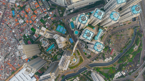 Aerial view of "Taman Anggrek" the biggest shopping mall and apartment in Jakarta when sunrise. Jakarta, Indonesia, August 22, 2021