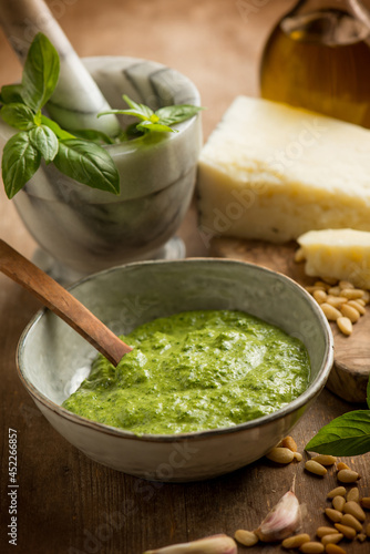 bowl with traditional italian pesto and ingredients