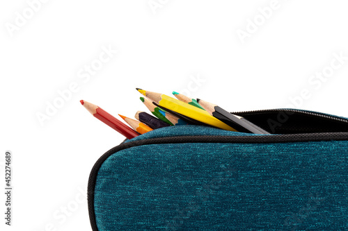 Pencils in case isolated on white background.