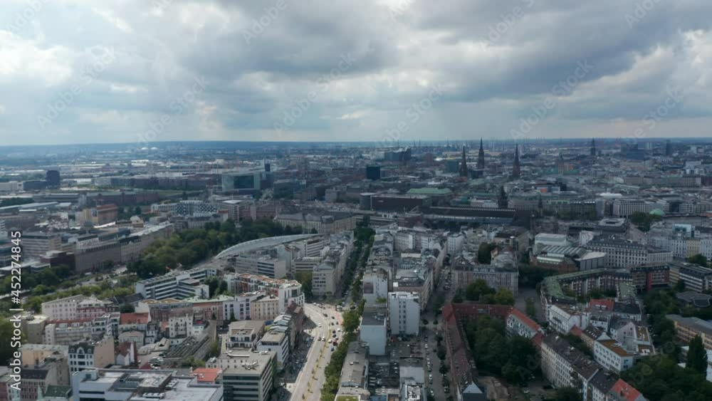 Forwards fly above urban neighbourhood. Tilt down reveal of Hansaplatz square. Free and Hanseatic City of Hamburg, Germany Forwards fly above urban neighbourhood. Tilt down reveal of Hansaplatz square. Free and Hanseatic City of Hamburg, Germany
