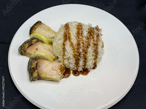 Baked pieces of sturgeon with Thai rice and Sichuan sauce
