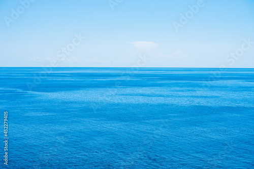 Beautiful colorful seascape. Blue water and blue sky at sunny day