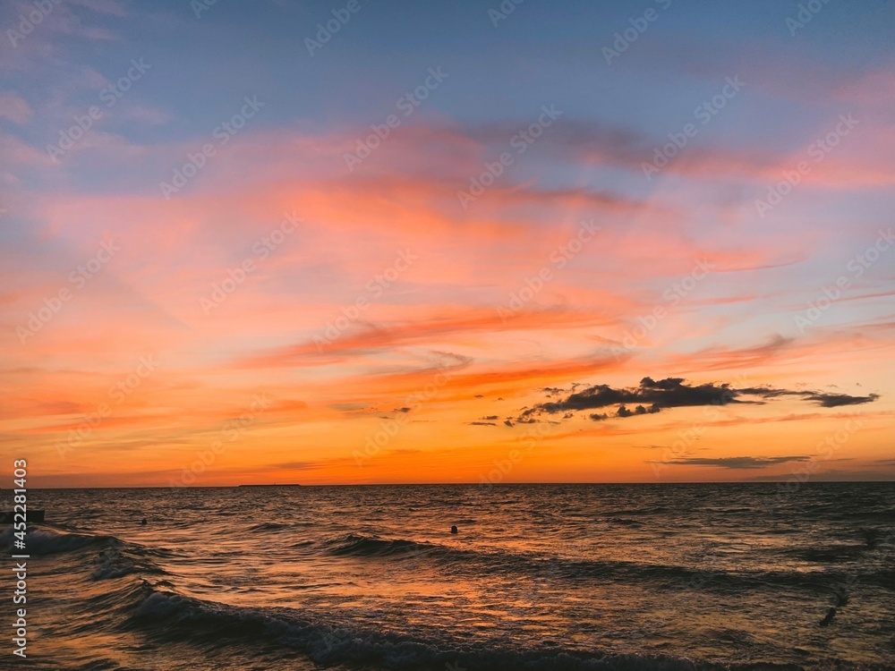 Fototapeta premium Beautiful sky colors after the sunset at the sea