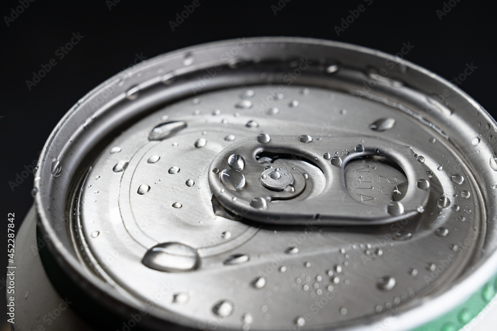 closed aluminum can of drink. close-up. bar. closed aluminum can of drink. close-up. bar.
