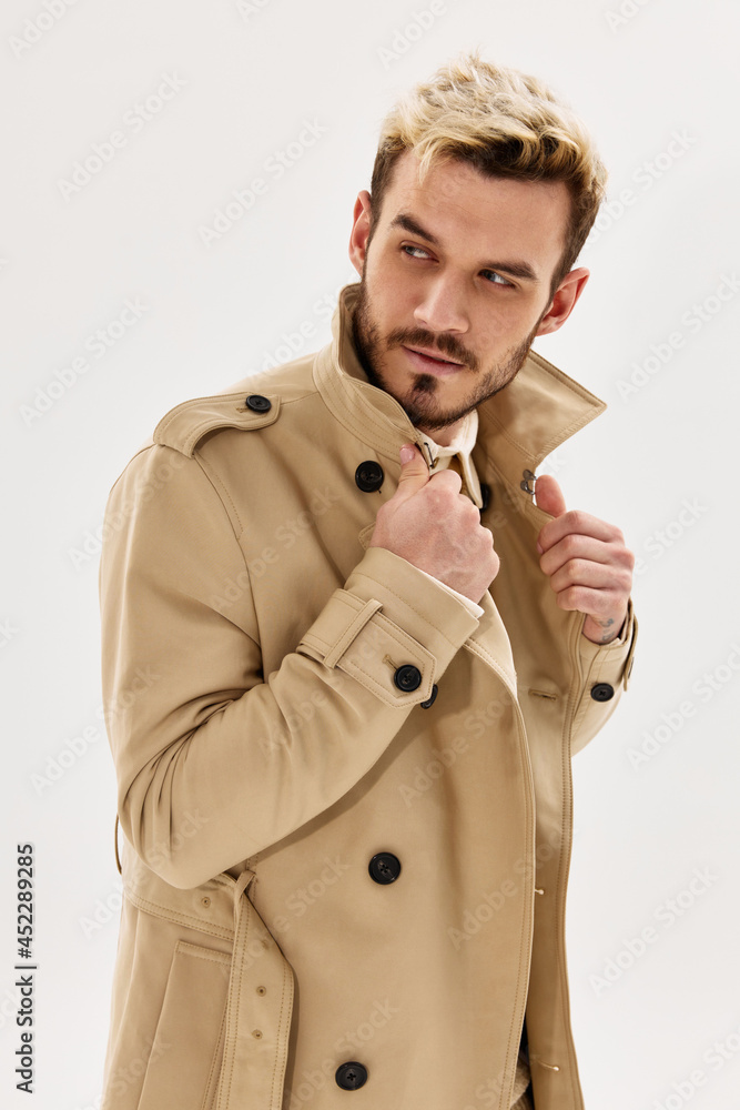 handsome man in coat autumn style fashion studio light background handsome man in coat autumn style fashion studio light background