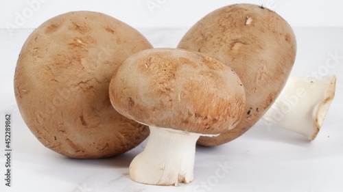 Close up of brown champignon mushrooms