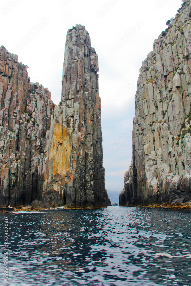 Tall Dolomite cliff face in the Tasmanian Peninsular. Unusual shapes. No people.