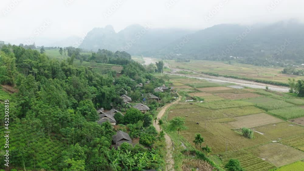 Aerial Beautiful Shot Of Mountains Against Foggy Sky, Drone Flying Over Green Landscape - Mu Cang Chai, Vietnam Aerial Beautiful Shot Of Mountains Against Foggy Sky, Drone Flying Over Green Landscape - Mu Cang Chai, Vietnam