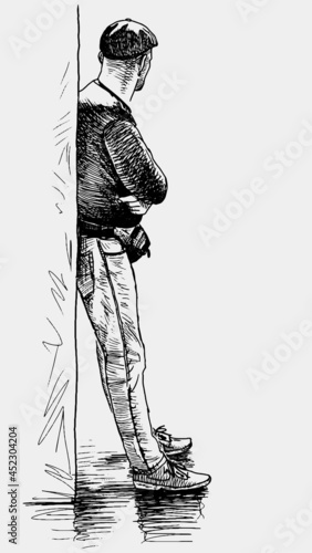 Sketch of casual urban man leaning against wall, waiting and looking away