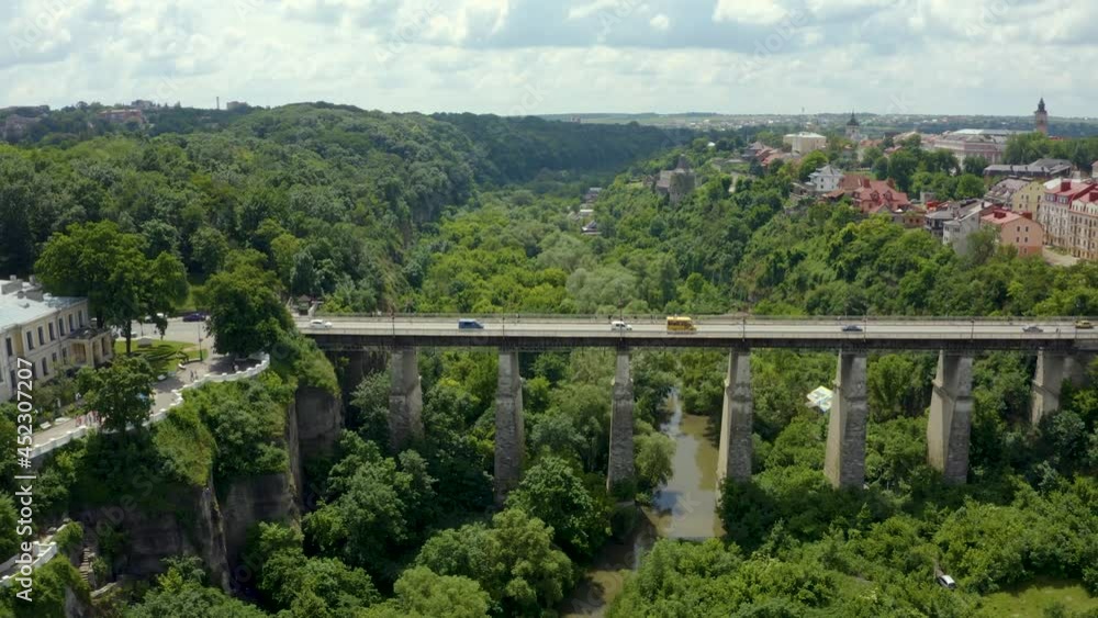 Huge stone bridge over the valley and forest in Kam'yanets'-Podil's'kyi in Ukraine. Huge stone bridge over the valley and forest in Kam'yanets'-Podil's'kyi in Ukraine.