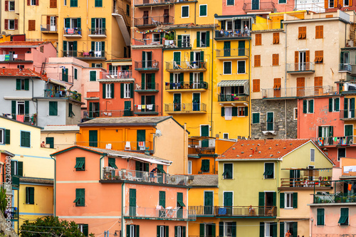 colorful house, buildings and old facade with windows in small picturesque village Manarola Cinque terre in liguria