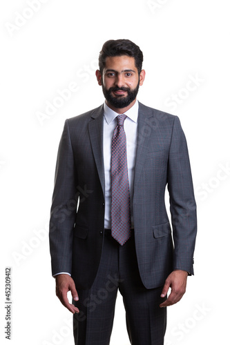 A young man wearing suit on a white background