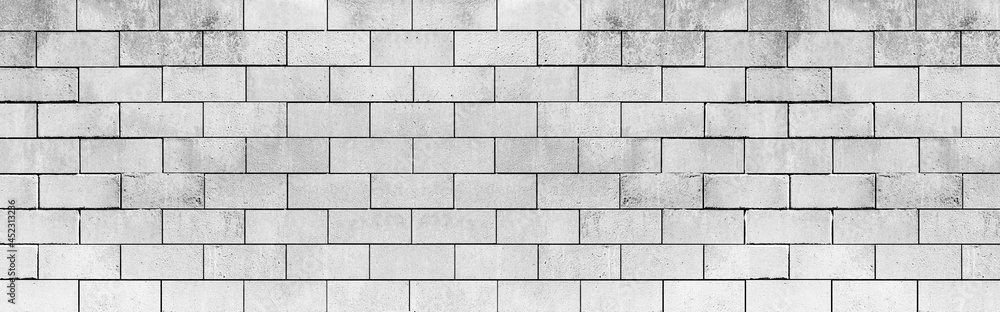 Naklejka premium Panorama of Old white stone brick wall texture for background
