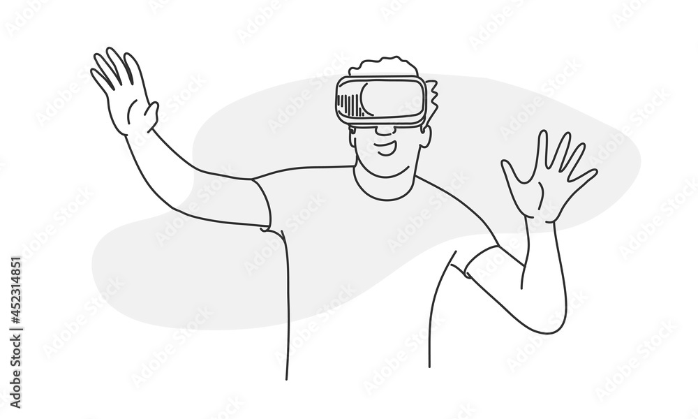 Young man wearing virtual reality headset working on project. Young man wearing virtual reality headset working on project.