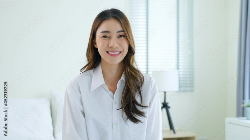 Portrait of Asian Beautiful girl in pajamas smile and look at camera. Portrait of Asian Beautiful girl in pajamas smile and look at camera.