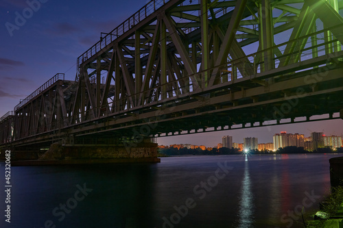 Fototapeta Naklejka Na Ścianę i Meble -  Dawn over the railway bridge in Voronezh