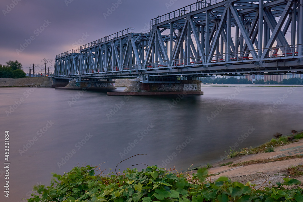 Fototapeta premium Dawn over the railway bridge in Voronezh