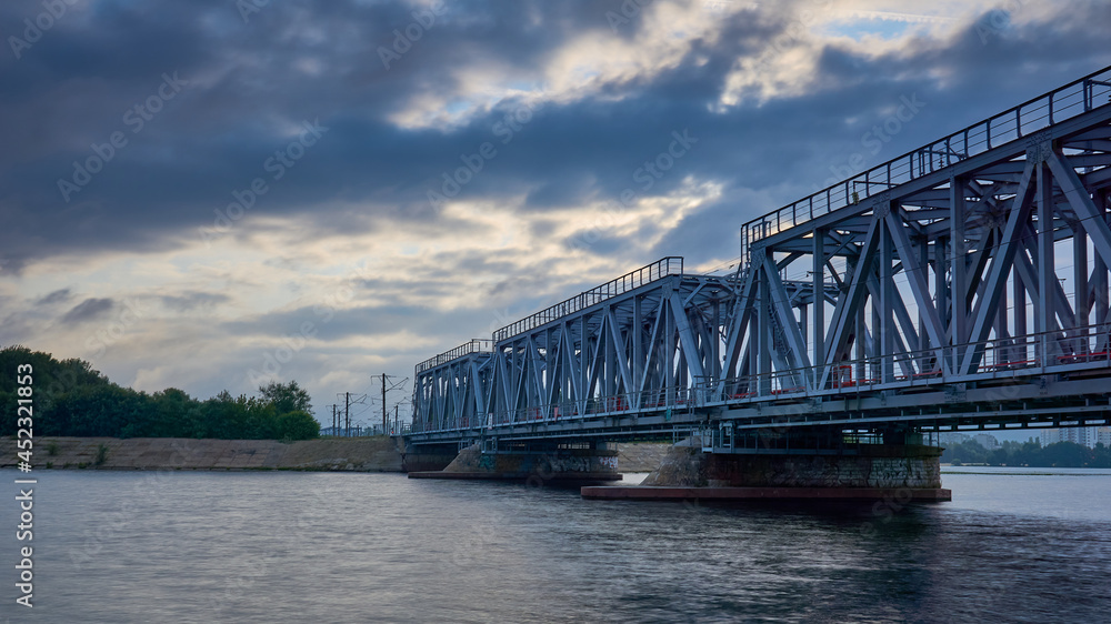 Fototapeta premium Dawn over the railway bridge in Voronezh