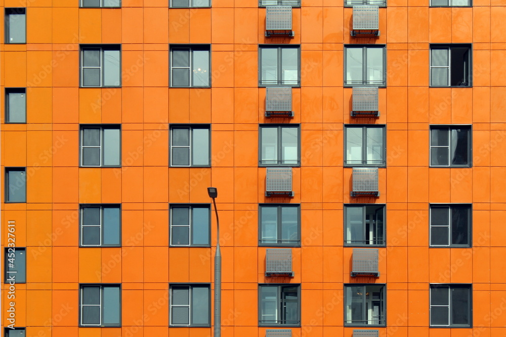Texture unusual abstract orange house with windows