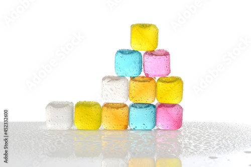pile of reusable colorful plastic ice cubes