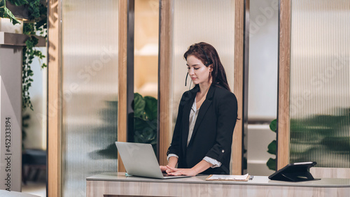 Hotel check in at reception or front office being given key card