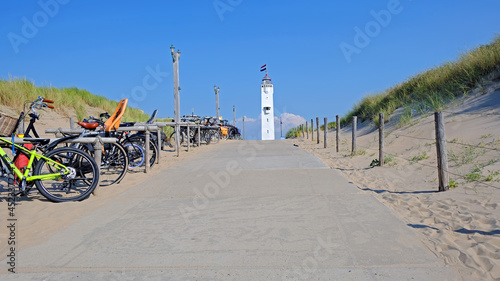 The lighthouse in Noordwijk aan Zee in front of the entrance to the beach in the Netherlands