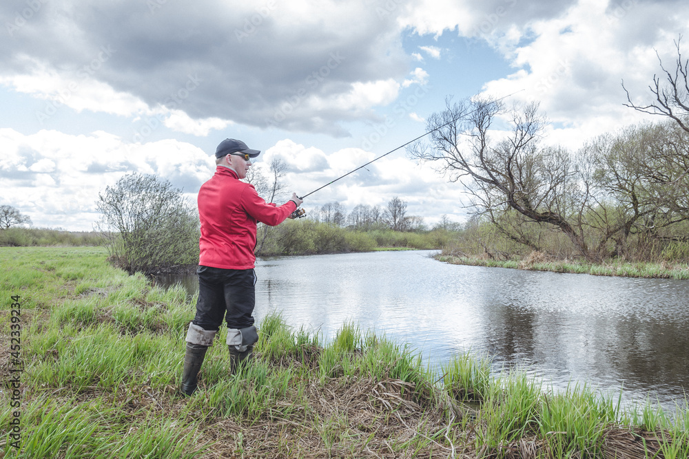 Fisherman on the banks of a picturesque river. Fisherman on the banks of a picturesque river.