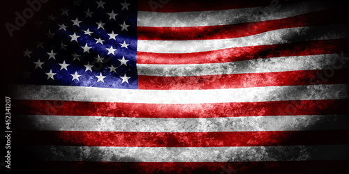 USA wavy flag in grunge style with darkened edges. Old texture