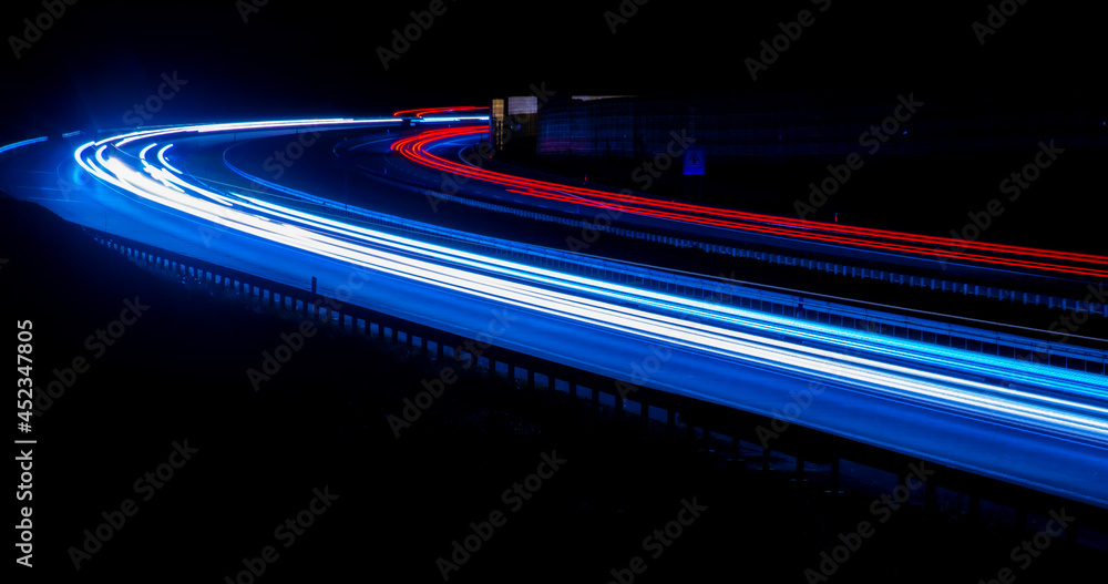 Night road lights. Lights of moving cars at night. long exposure red, blue, green Night road lights. Lights of moving cars at night. long exposure red, blue, green