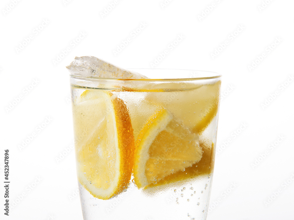Cold fresh lemonade.
Lemonade with ice cubes on white background. Cold fresh lemonade.
Lemonade with ice cubes on white background.