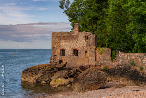 The disused bath-house at Elberry Cove, Torbay, England, UK photo