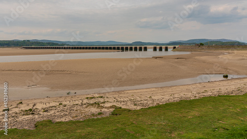 Looking at the railway bridge over the River Kent in Arnside, Cumbria, England, UK